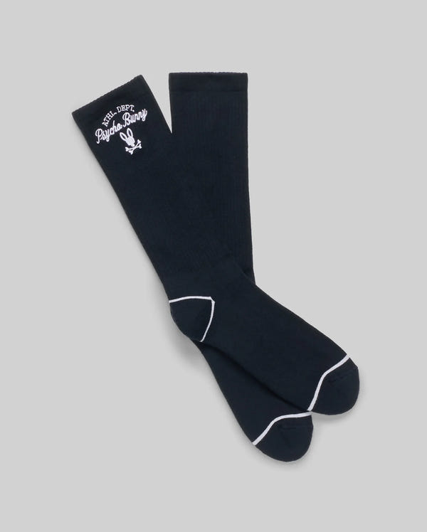 The MENS 3 PACK SPORT SOCK - MO2200006 by Psycho Bunny includes black knee-high sport socks with white trim, featuring "Psycho Bunny" text and a bunny logo at the top, inspired by vintage motifs. Background is light gray.