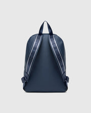 Classic Bunny Backpack in navy blue with a smooth, matte finish, featuring white and light blue striped webbing with repeated Psycho Bunny text branding on the adjustable shoulder straps. (5)