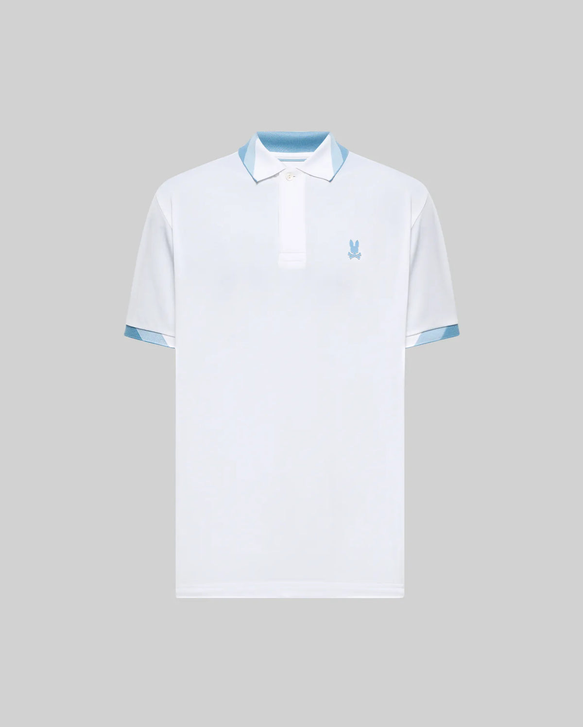 Mens Onyx Sport Polo, white pique knit, classic fit, with light blue ribbed collar and patterned sleeve cuffs, featuring a small embroidered light blue Psycho Bunny skull logo on the left chest.