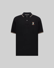 Mens Ara Pique Polo in classic fit black pique, featuring a colorful embroidered Psycho Bunny skull logo on the left chest and tri-stripe tipping on the collar and cuffs.