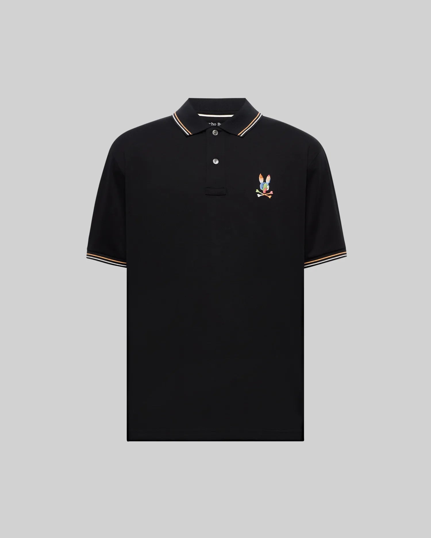 Mens Ara Pique Polo in classic fit black pique, featuring a colorful embroidered Psycho Bunny skull logo on the left chest and tri-stripe tipping on the collar and cuffs.