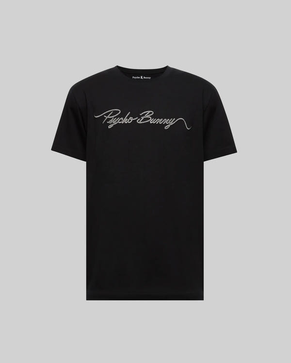 The MENS CYRUS WORDMARK GRAPHIC TEE (MT0200018) by Psycho Bunny is a black Pima cotton short-sleeve shirt featuring "Psycho Bunny" in white cursive across the chest, shown on a plain light gray background.