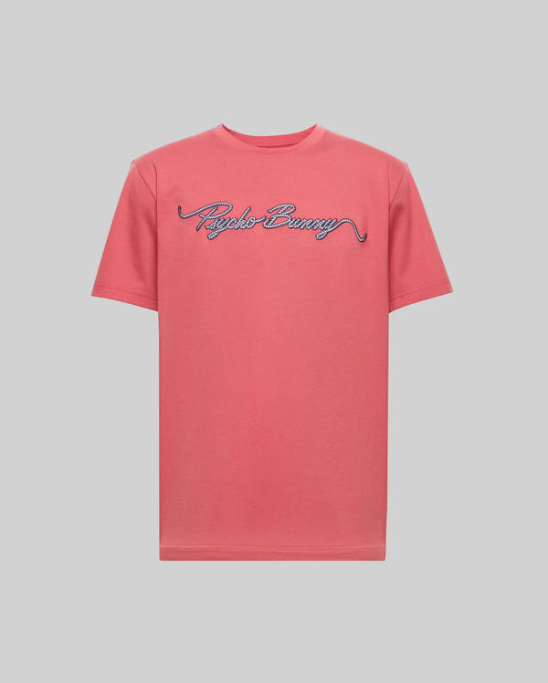 The Psycho Bunny MENS CYRUS WORDMARK GRAPHIC TEE (MT0200018) is a short-sleeved, coral pink Pima cotton shirt with a blue and white "Psycho Bunny" cursive wordmark, shown on a plain light gray background.