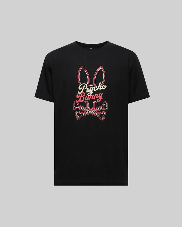 The Psycho Bunny MENS GARRET GRAPHIC TEE (MT0200050) is a black t-shirt with a large front graphic of bunny ears, crossed bones, and "Psycho Bunny" in stylized text, displayed on a plain light gray background.