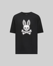 The Psycho Bunny MENS RYDER OVERSIZED TEE (MT0200062) is a black premium Pima cotton shirt with a bold white bunny head and long ears over a skull and crossbones graphic, displayed on a plain light gray background.