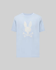 The Psycho Bunny MENS GRANT BUNNY GRAPHIC TEE (MT0200081) features a light blue Pima cotton build with a bold white bunny head over crossed bones graphic on the chest, set against a plain grey background.