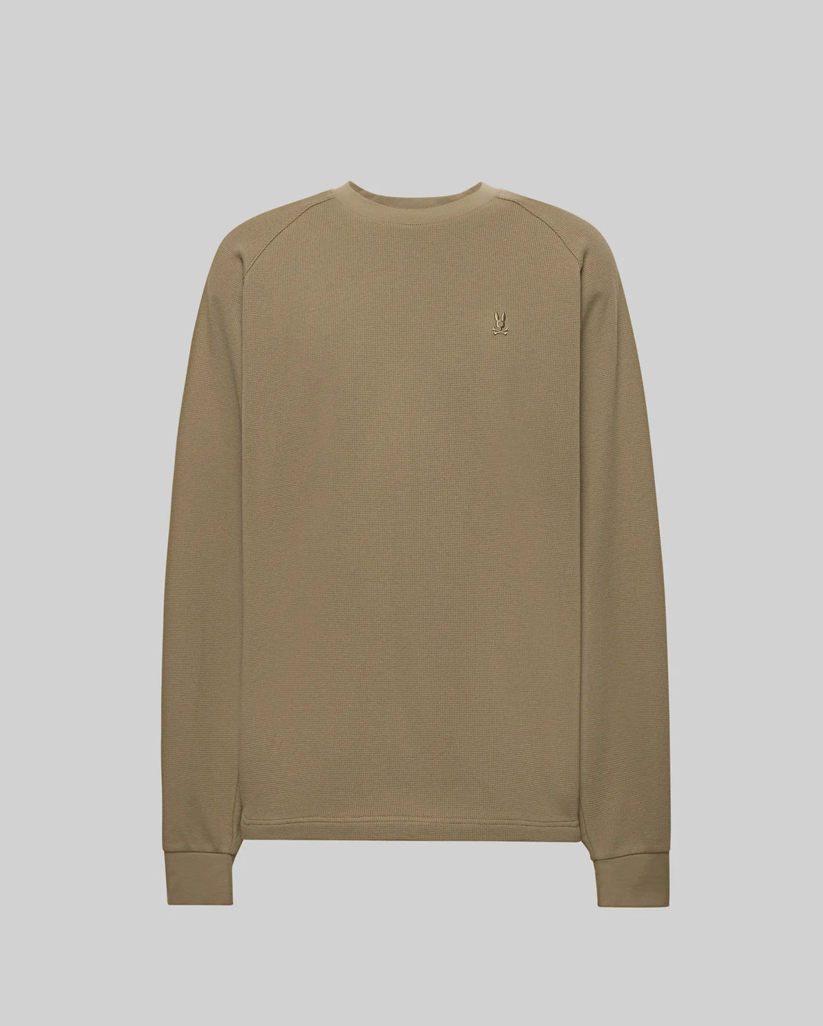 The Psycho Bunny MENS EVANS WAFFLE - MT0200091 is a khaki waffle knit long-sleeve sweater featuring a small embroidered Bunny logo on the left chest, displayed against a light gray background.
