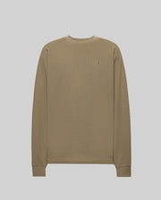 The Psycho Bunny MENS EVANS WAFFLE - MT0200091 is a khaki waffle knit long-sleeve sweater featuring a small embroidered Bunny logo on the left chest, displayed against a light gray background.