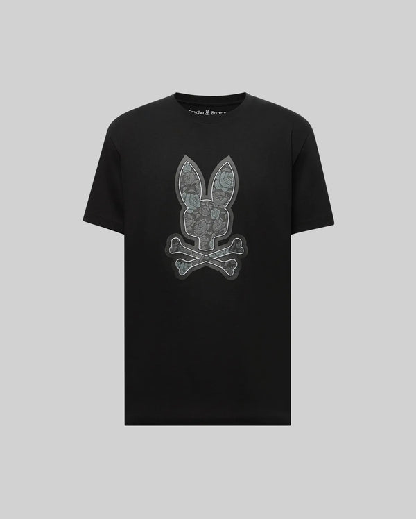 The Psycho Bunny MENS ROWEN BUNNY GRAPHIC TEE - MT0200101 is a black short-sleeve Pima cotton shirt featuring a large gray bunny skull and crossbones graphic on the front.