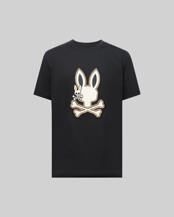 The Psycho Bunny MENS WADE GRAPHIC TEE (MT0200106) is made from 100% cotton and features a large white bunny head over crossed bones on the front, set against a plain light gray background.