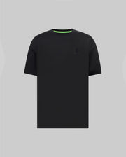 Mens Oscar Oversized Tee in black jersey knit, featuring a relaxed fit, small tonal embroidered Psycho Bunny skull logo on the left chest, and a vibrant neon green inner collar.