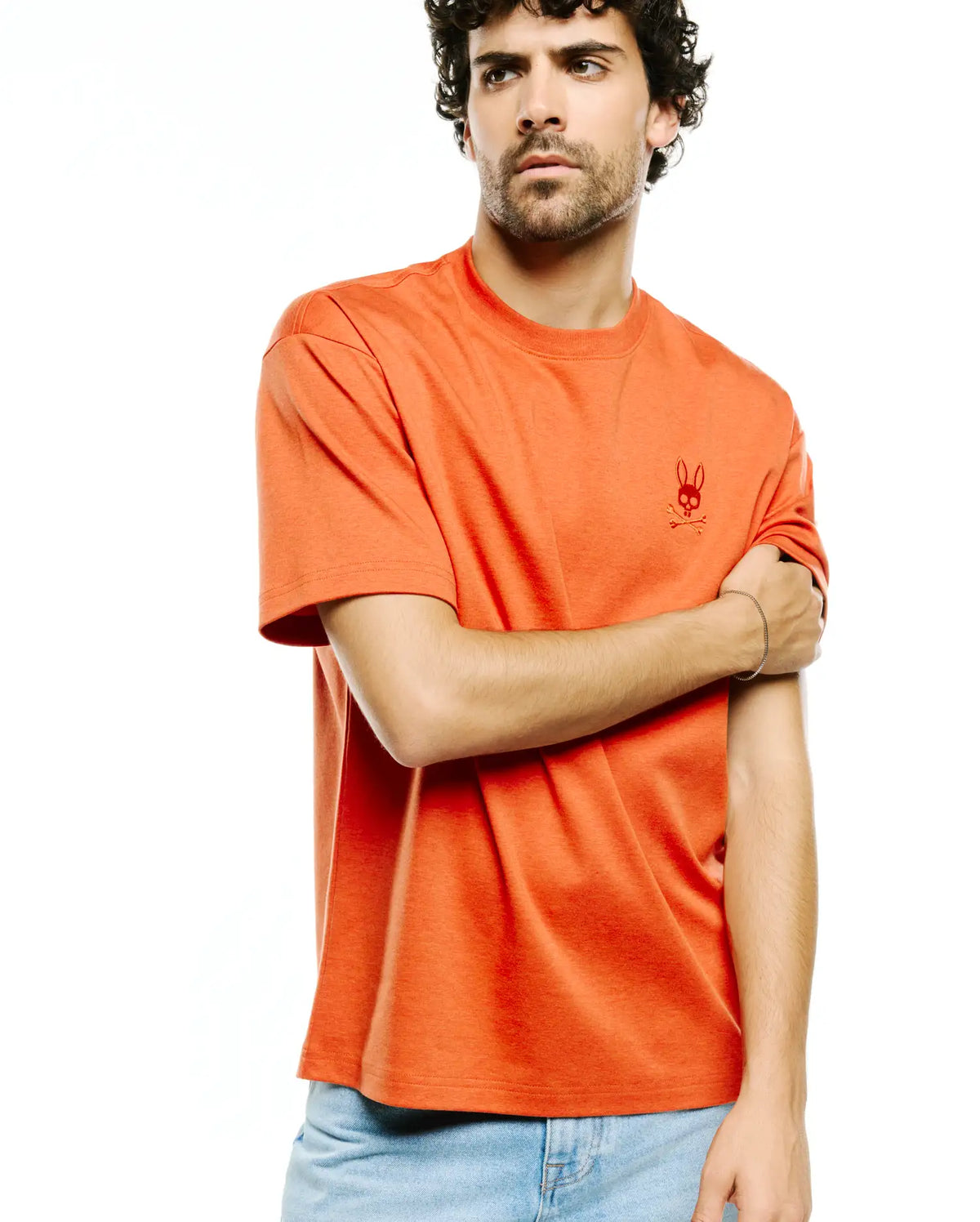Men's Oscar Oversized Tee, a heathered orange, soft jersey knit t-shirt featuring a small, tonal embroidered Psycho Bunny skull logo on the left chest. (4)