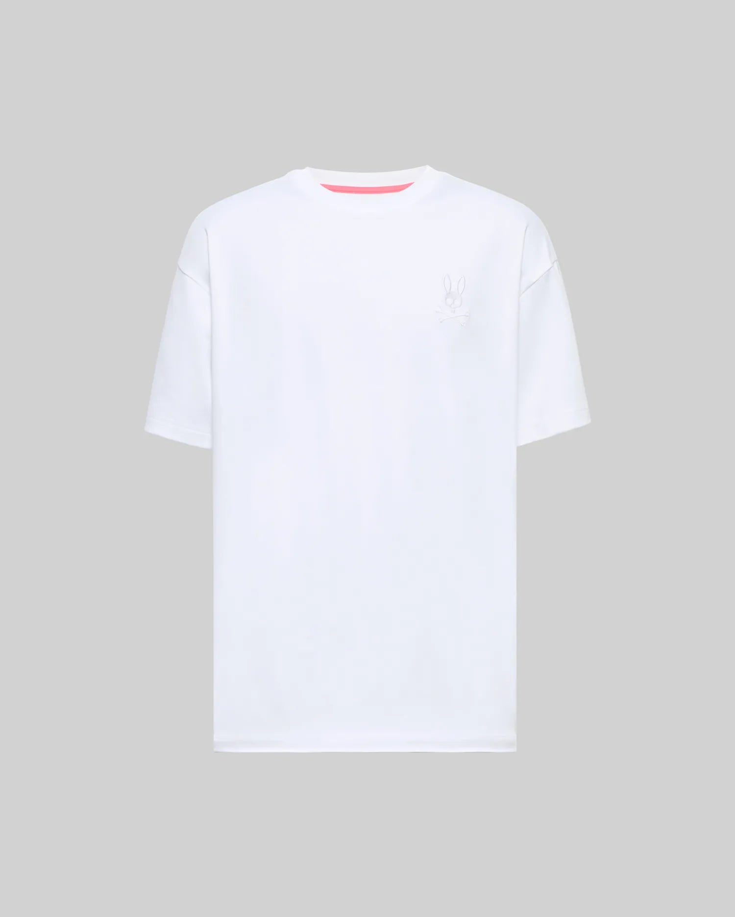 Mens Oscar Oversized Tee, white smooth jersey with an oversized fit, featuring a small tonal embroidered Psycho Bunny skull logo on the left chest and a subtle pink inner neckline.