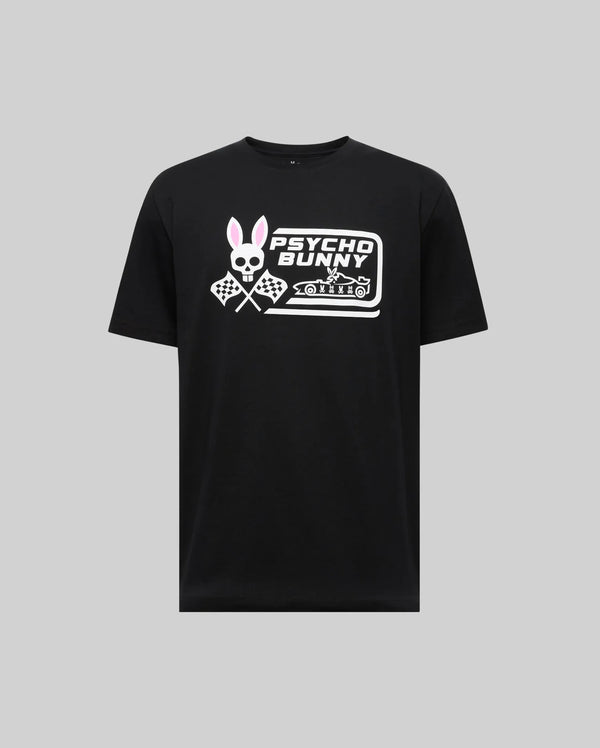 The Psycho Bunny MENS RACING GRAPHIC TEE (MT0200243) is a black Pima cotton t-shirt featuring a bold white skull bunny logo with pink ears, crossed checkered flags, and "Psycho Bunny" text across the chest.