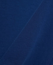 Mens Emmanuel Graphic Tee in rich navy blue, showcasing a soft, smooth jersey fabric on the main body, complemented by a finely textured, diagonal ribbed knit detail. (6)