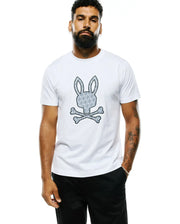 Mens Jaden Appliqué Graphic Tee, a white classic fit jersey t-shirt featuring a large central grey Psycho Bunny skull and crossbones graphic with an internal diagonal bunny pattern. (2)