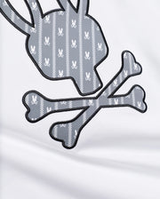 MENS JADEN APPLIQUÉ GRAPHIC TEE featuring a large white jersey fabric with a grey and white patterned bunny skull and crossbones appliqué, outlined in black embroidery. (6)