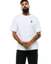 Mens Jaydon Pima Cotton Oversized-Fit Tee, a white smooth Pima cotton jersey t-shirt featuring a small black embroidered Psycho Bunny skull logo on the left chest. (1)