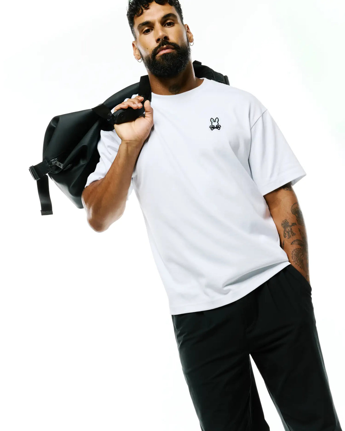 Mens Jaydon Pima Cotton Oversized-Fit Tee in crisp white, featuring a smooth jersey texture and a small, embroidered black Psycho Bunny skull logo on the left chest. (3)