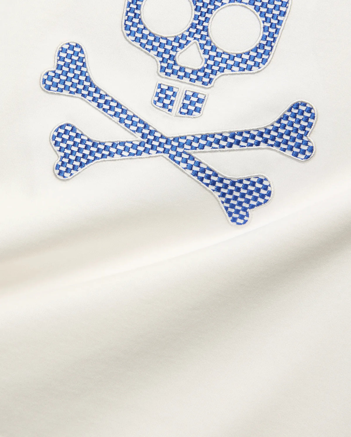 Mens Stan Graphic Tee in white smooth jersey, featuring a large embroidered Psycho Bunny skull and crossbones logo with a blue and white checkerboard pattern. (6)