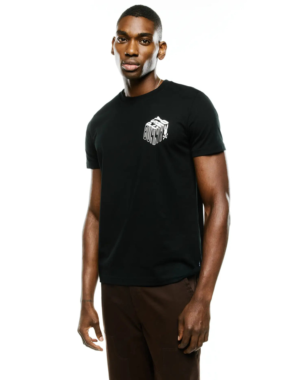 Men's Conan Pima Back Graphic Tee, a black Pima cotton jersey t-shirt with a classic fit and a small white stylized Psycho Bunny block graphic on the left chest. (2)