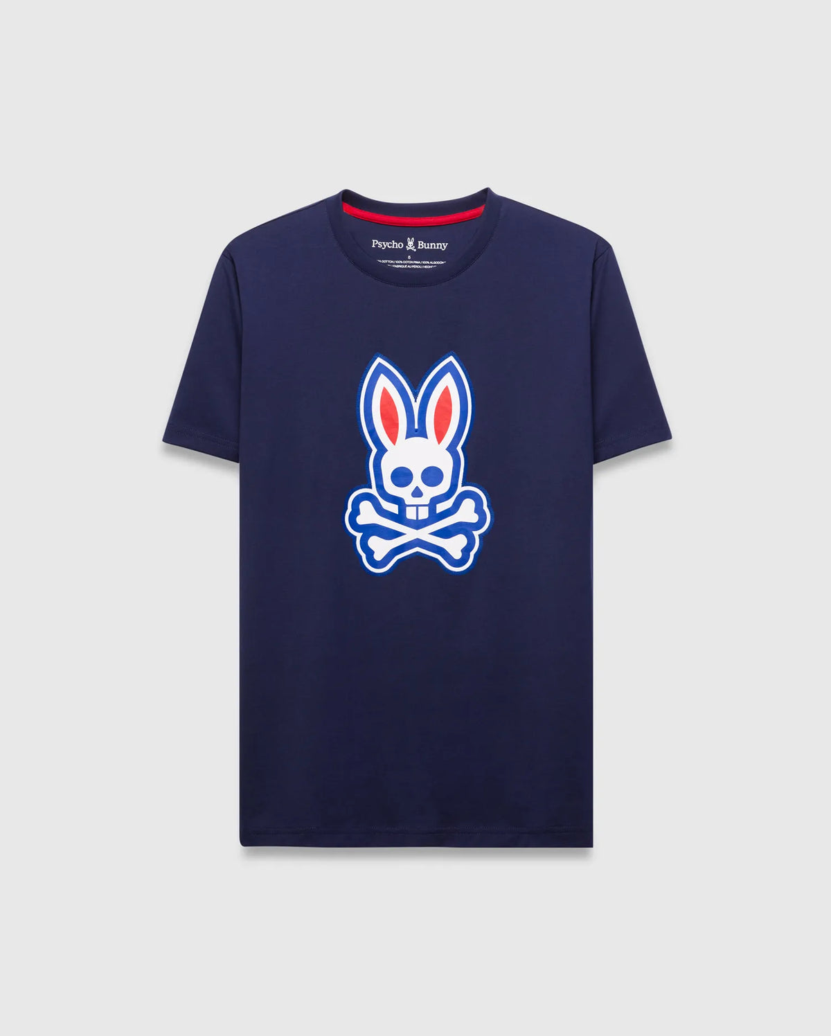 Mens John Graphic Tee, a classic fit navy jersey t-shirt featuring a large white, red, and blue Psycho Bunny skull logo graphic on the center chest and red neck tape. (1)