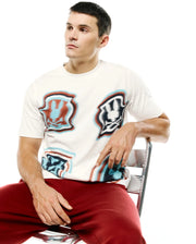 Men's Klaus Jacquard Tee, a cream relaxed-fit top with an all-over distorted blue, red, and black Psycho Bunny skull logo jacquard pattern. (3)