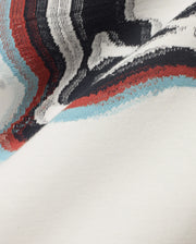 Men's Klaus Jacquard Tee featuring a cream jersey knit base with a bold jacquard pattern of black, white, red, and light blue wavy stripes. (6)