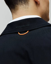 Mens Maverick Overshirt, a dark navy smooth-weave overshirt featuring subtle embroidered PSYCHO BUNNY branding on the back collar and a signature orange locker loop.