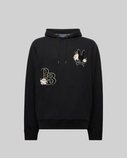 The MENS AUGUSTE HOODIE - MT0500043 by Psycho Bunny is a premium cotton regular fit hoodie with a front pocket, white flower embroidery, "PB" on the left chest, and a black bunny holding flowers on the right chest. Displayed on gray.