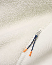 Men's Rowley Sherpa Zip Jacket featuring creamy sherpa fleece and textured knit fabric, a silver zipper, and a navy cord zipper pull with bright orange tips. (7)