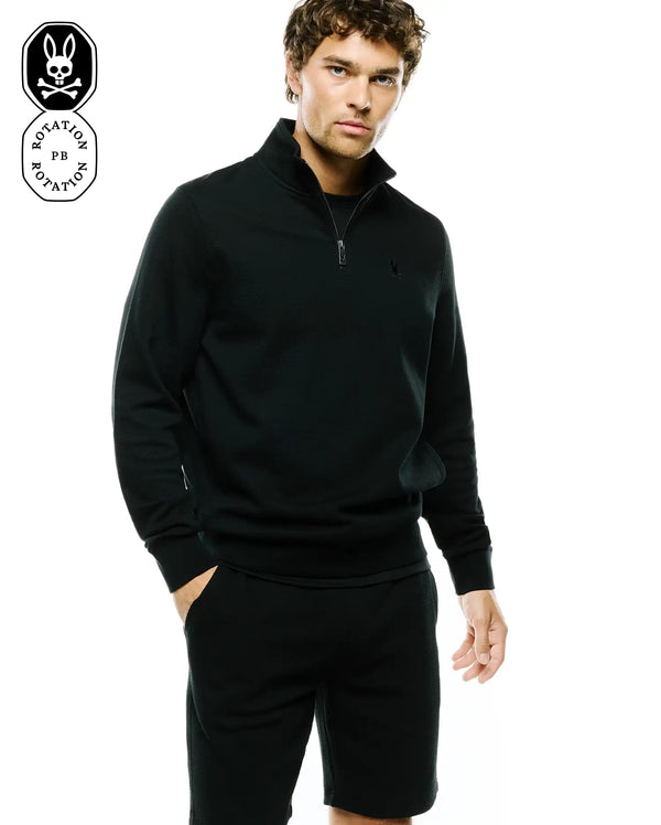 Black Mens Marc Quarter-Zip Sweatshirt in a textured knit, featuring a classic fit, silver quarter-zip closure, and a small embroidered Psycho Bunny skull logo on the left chest.