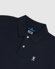 The Psycho Bunny Men's Big and Tall Classic Piqué Polo Shirt (B9K001ARPC) is made from soft Pima cotton and features a collar, buttoned placket, and black diamond-knit piqué fabric with a small pink bunny embroidered logo with a skull on the left chest.